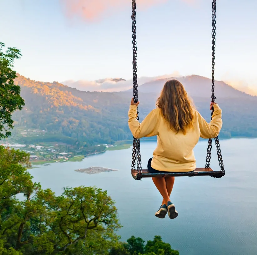 bali woman tourist swing