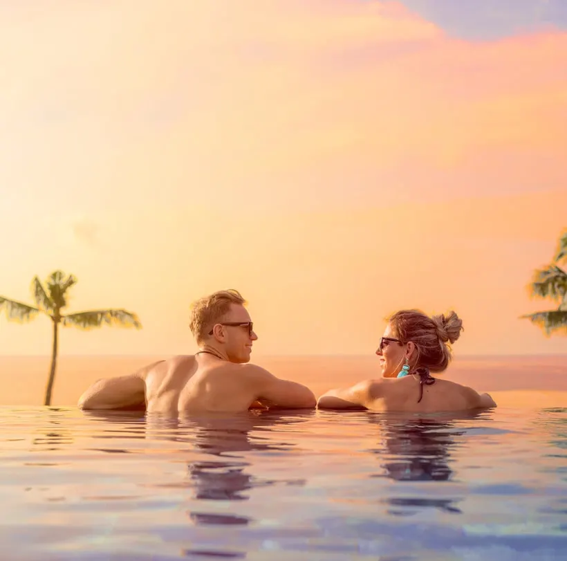 sunset pool couple