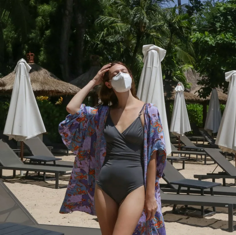woman mask beach