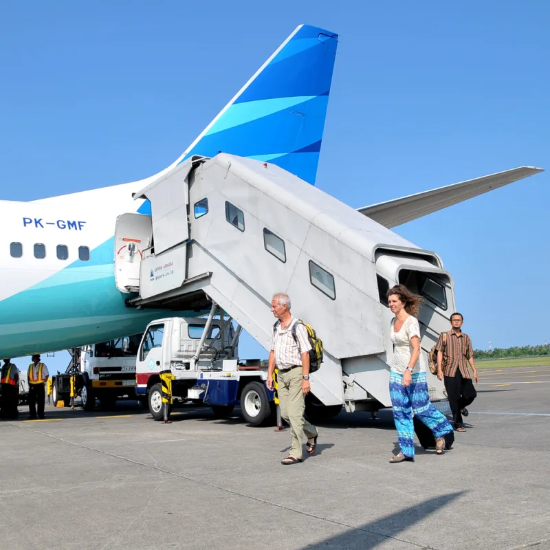 Travelers-Exit-A-Garuda-Airlines-Plane