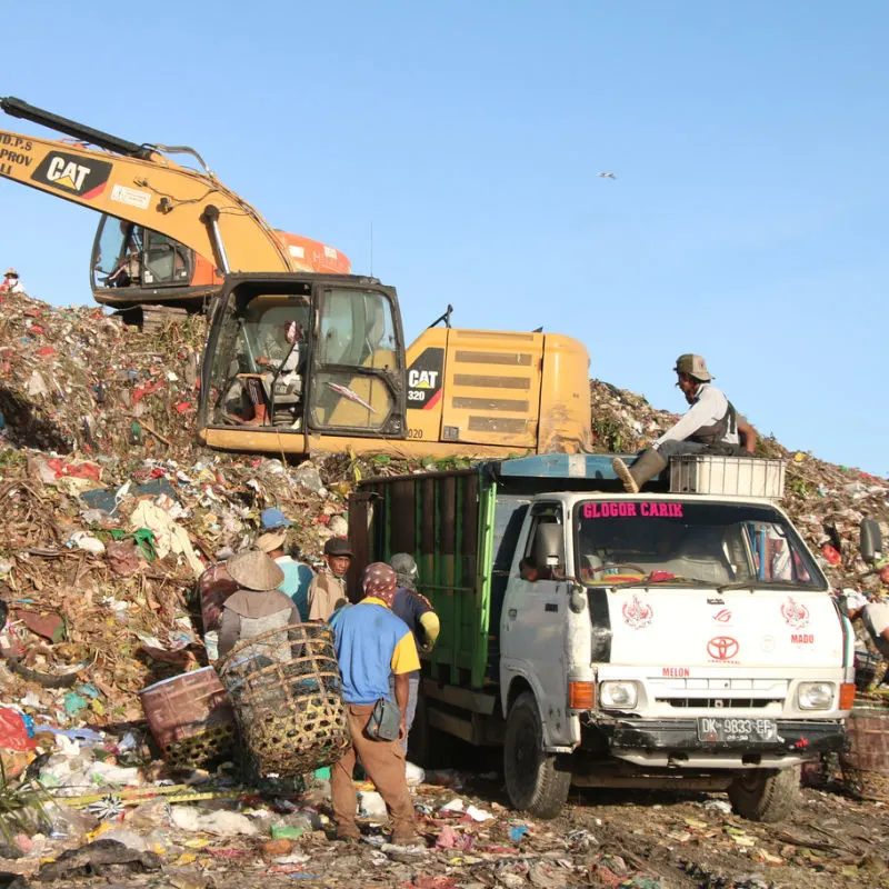 Bali-Workers-Dispose-Of-Garbage-Waste-At-Local-Landfill-Site