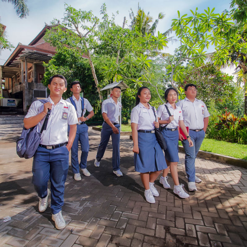 High-School-Students-Leave-School-Building-In-Denpasar-Bali