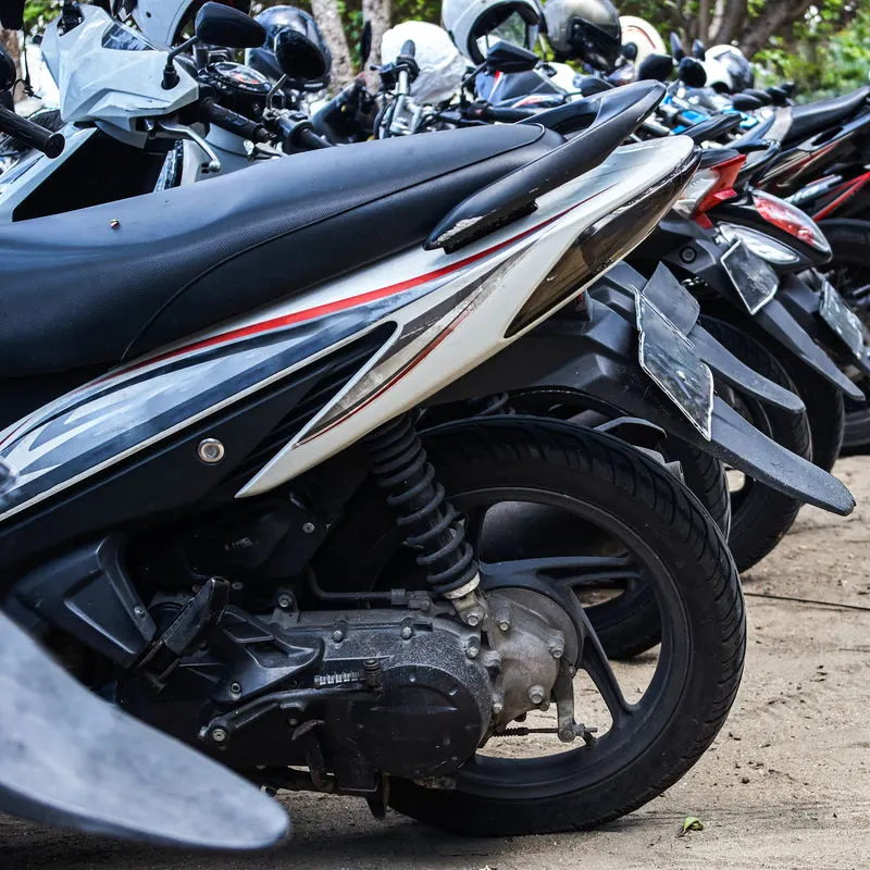 Mopeds-Parked-In-A-Line-In-Bali