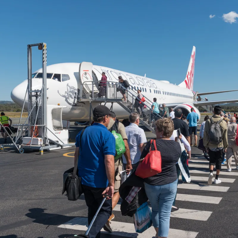 Passengers boarding a Virgin Australia flight