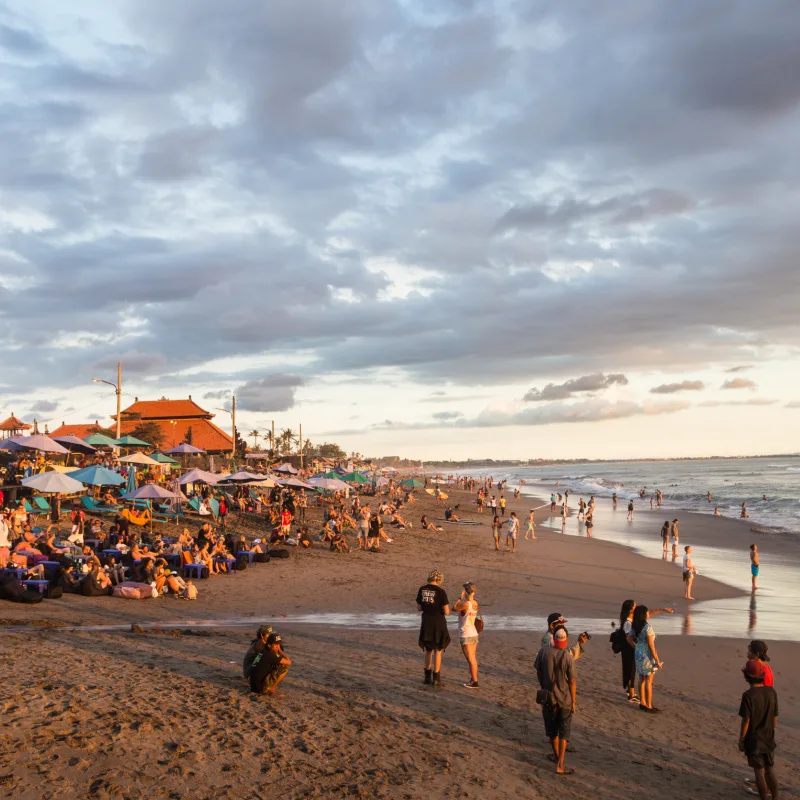 Tourists-and-Expats-Enjoy-Sunset-On-Canggu-Beach