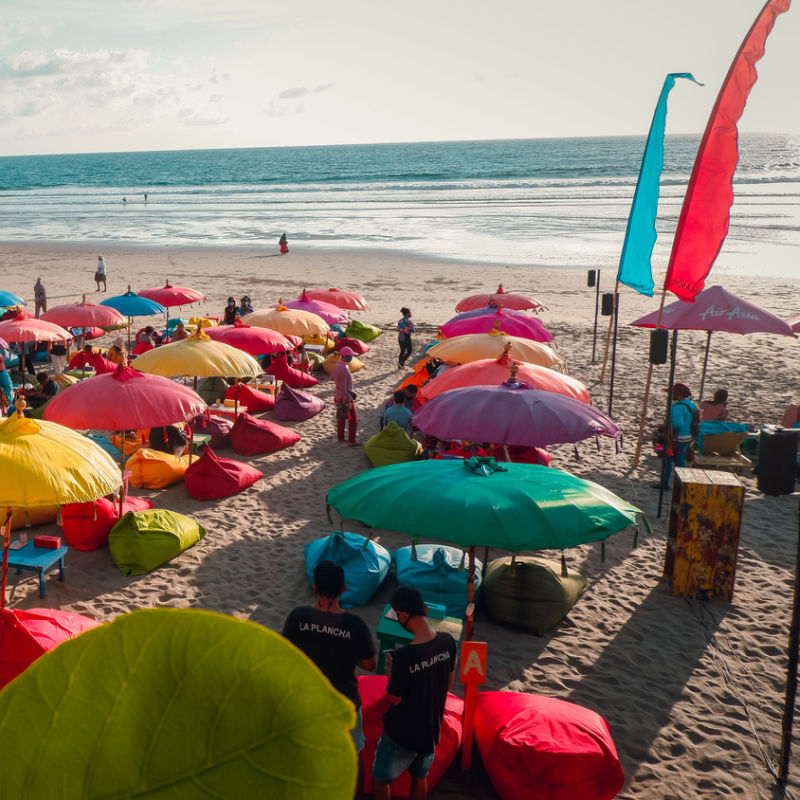 Bean-Bags-And-Umbrellas-For-Tourists-At-Double-Six-Beach-Canggu-Bali