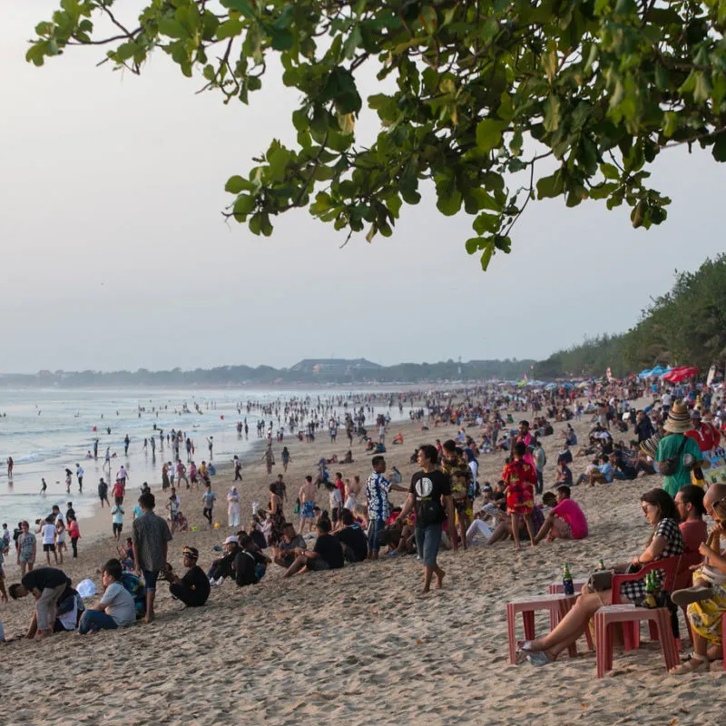Kuta-Beach-Bali-Busy-With-Tourists-Travelers-And-Families-On-Holiday