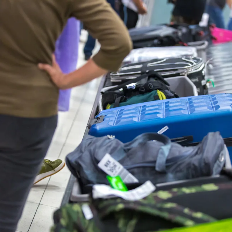 Luggage-At-Arrivals-Hall-In-Airport