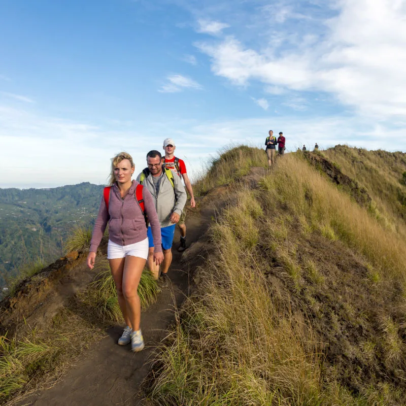 Tourists-Trek-A-Ridge-Of-Mount-Batur-In-Bali