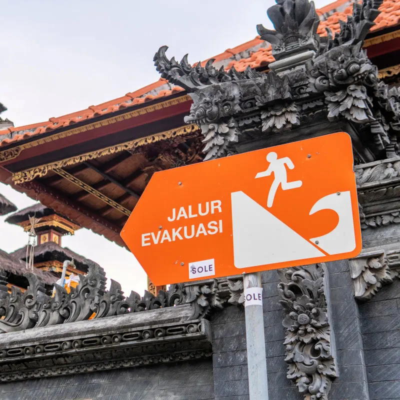 Bali-Tsunami-And-Earthquake-Evacuation-Sign-Next-To-Temple