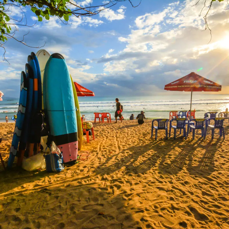Beach-Bar-With-Surf-Boards-And-Picnic-Chairs-In-Kuta-Bali