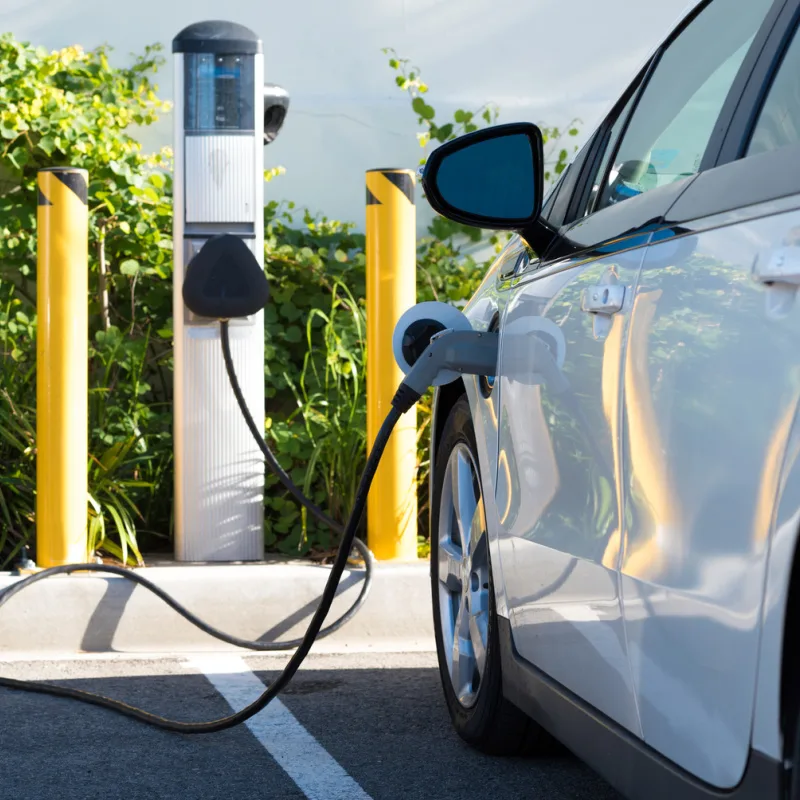 Electric-Car-Charges-At-Power-Point