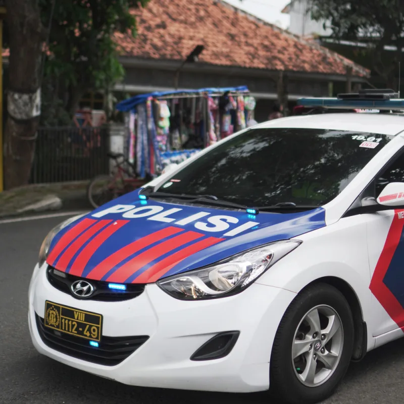 Police-Car-on-Street-In-Bali