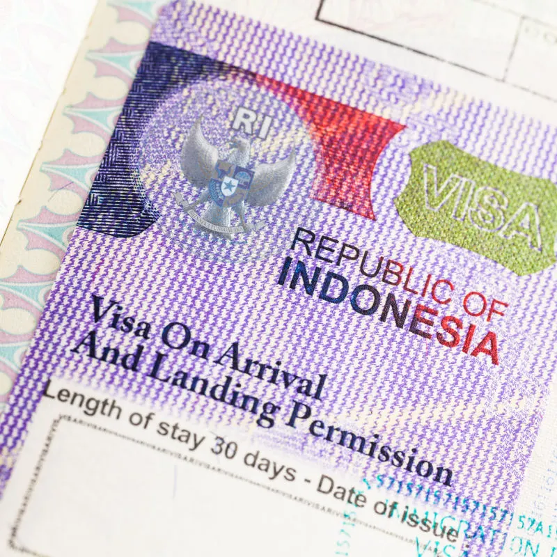 Visa-on-arrival-stamp-and-sticker-in-passport-for-Indonesia