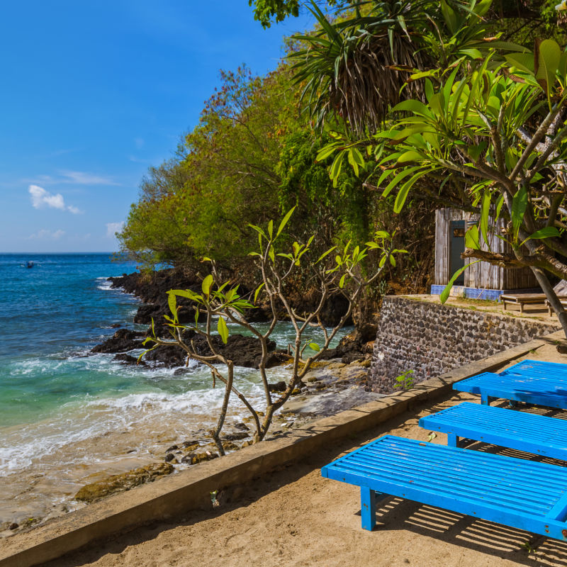 Sun loungers overlook Blue Lagoon in Padang Bai Bali