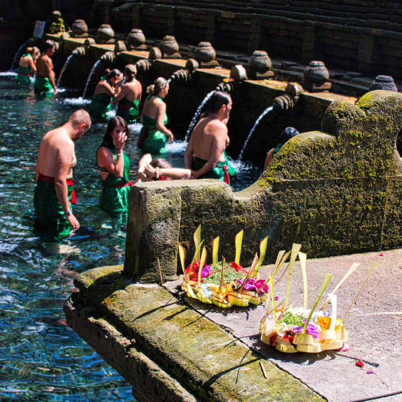 Tourists-Take-Part-In-Water-Cleansing-Ritual-At-Bali-Temple