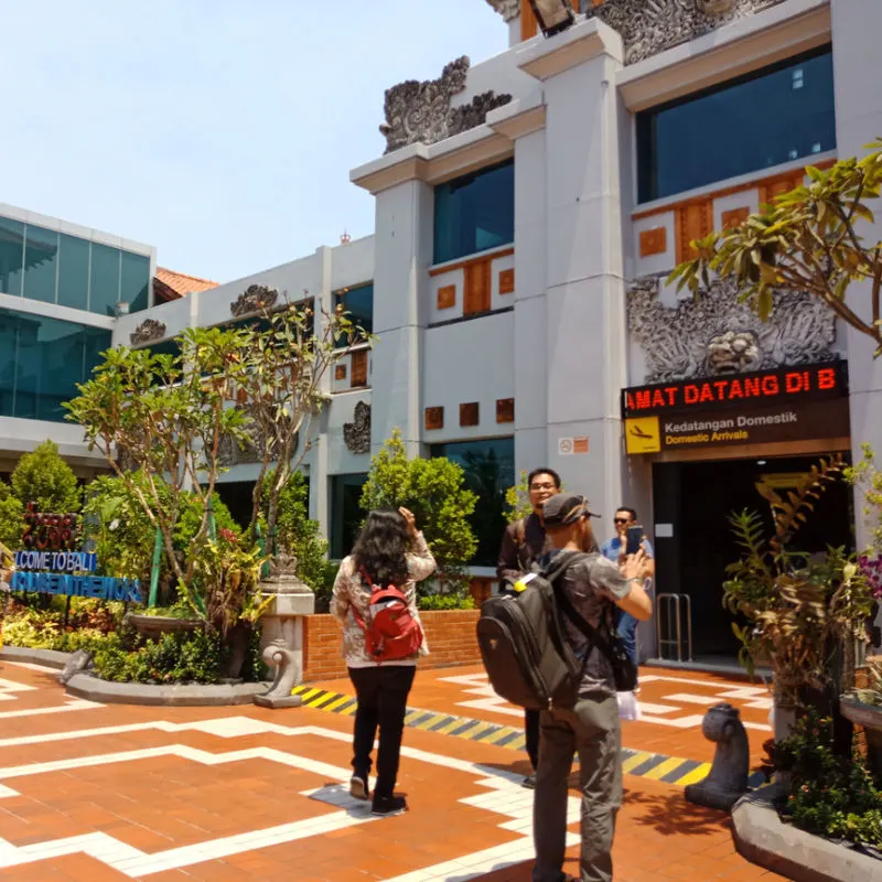 Tourists-Take-Photos-Outside-Bali-Domestic-Airport-Arrivals-Hall