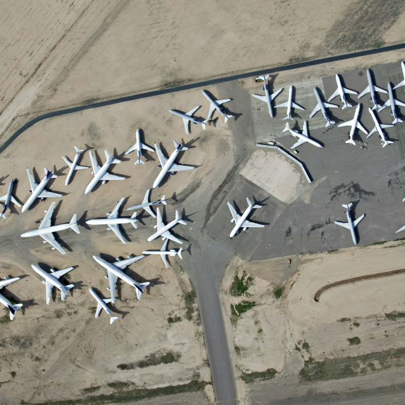 Airplanes Parked At Airport Ariel View Of White Aircraft