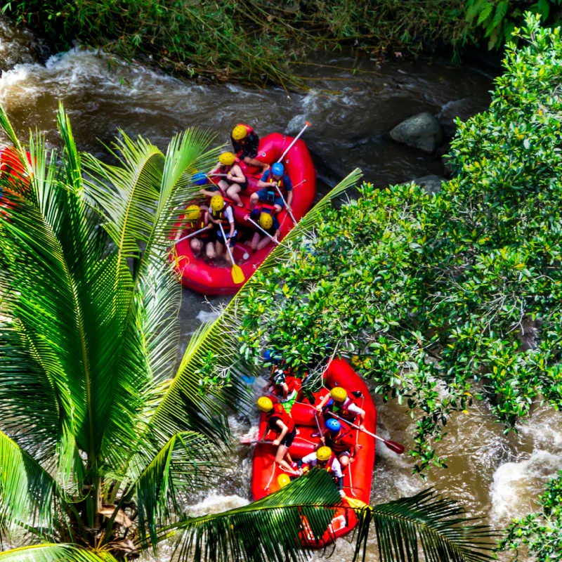 Arield-View-Of-Two-Raft-Boats-On-River-In-Bali-With-Tourists-On-Board