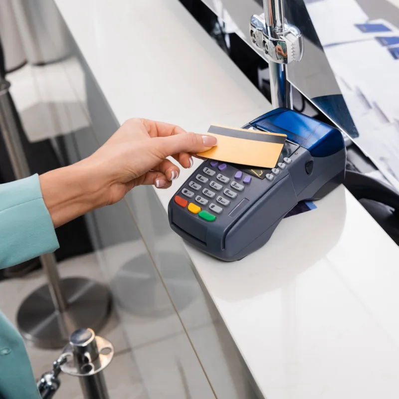 Card Payment Taken By Card Reader At A Counter
