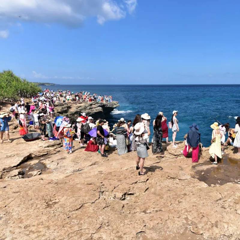 Chinese-Tourists-Explore-Coastal-Area-Of-Bali