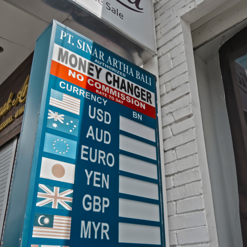 Close Up Of Money Changer Sign Board In Bali.