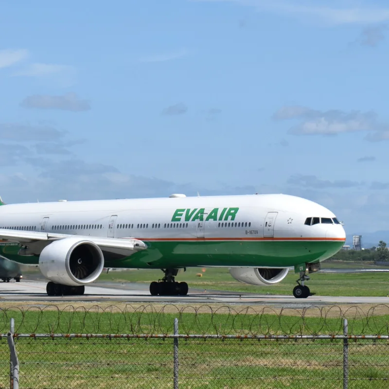 Eva Air Airplane Taxiing On Airport Tarmac Runway