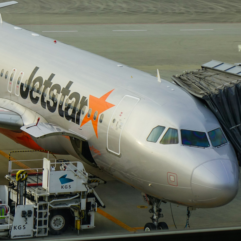 Jetstar Airplane At Airport Waiting For Passengers To Board