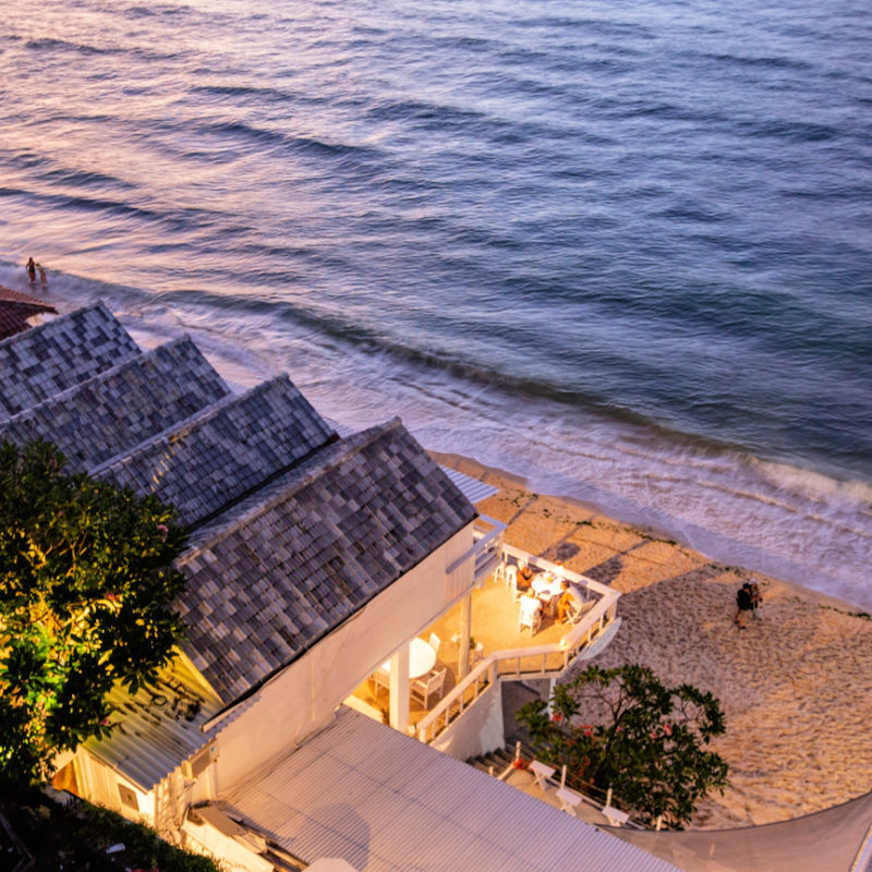 Luxury Kuta Beachfront Villa In Bali At Sunset.