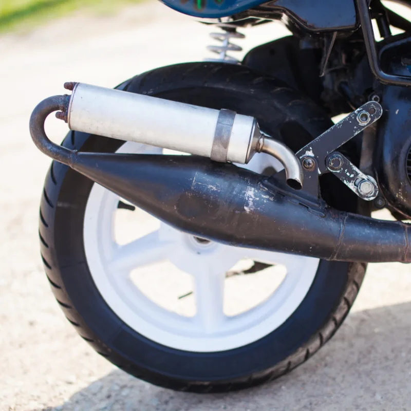 Moped Bike Wheel Close Up And Exhaust Pipe