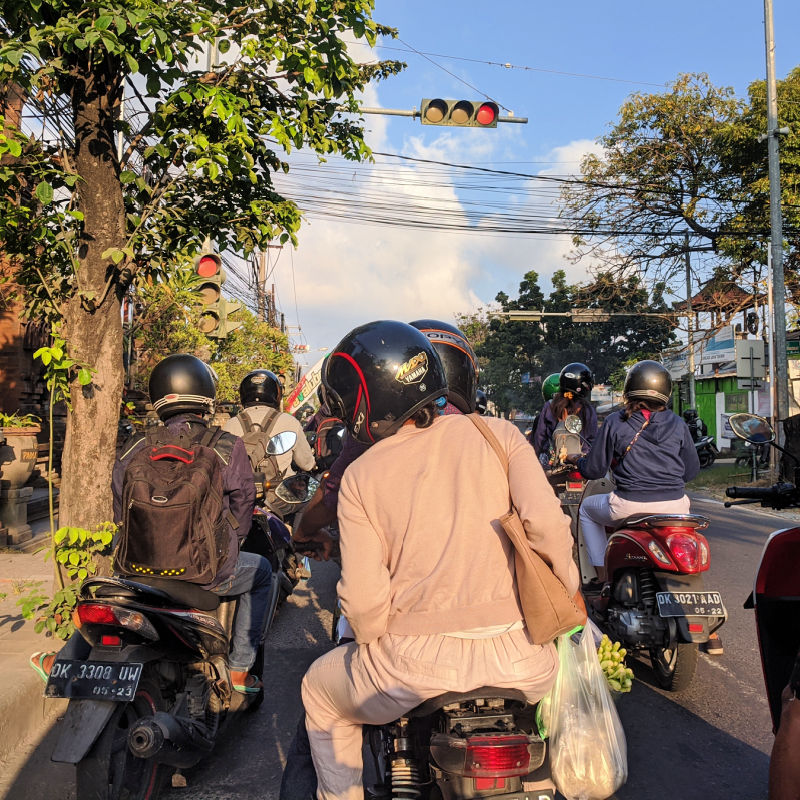 Mopeds-In-Bali-In-Traffic-Jam-At-Stop-Light