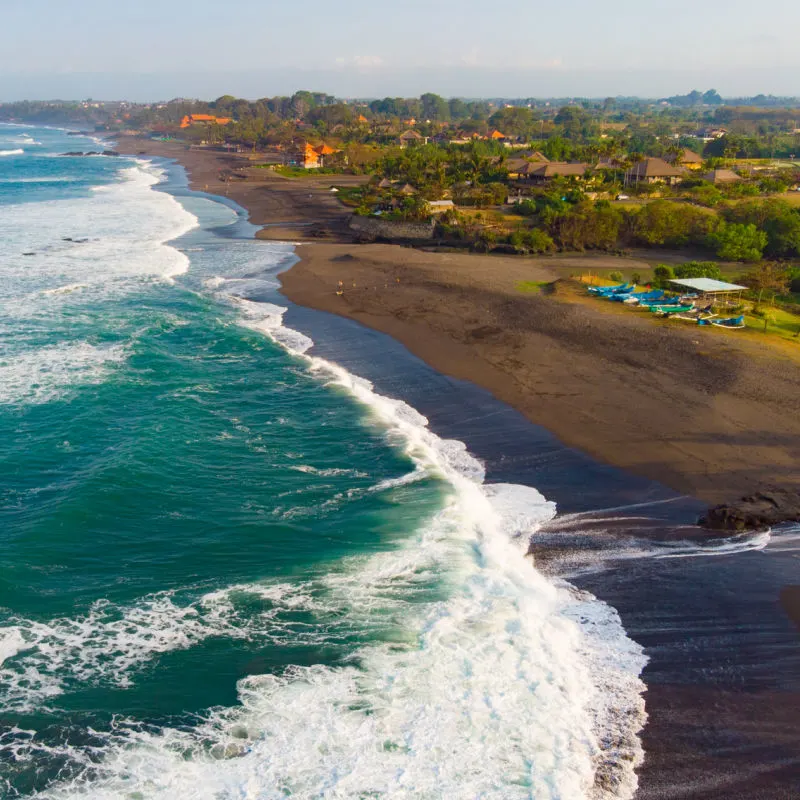 Pererenan Beach in Canggu Ariel View of ocean, Sand And Village In The Distance.