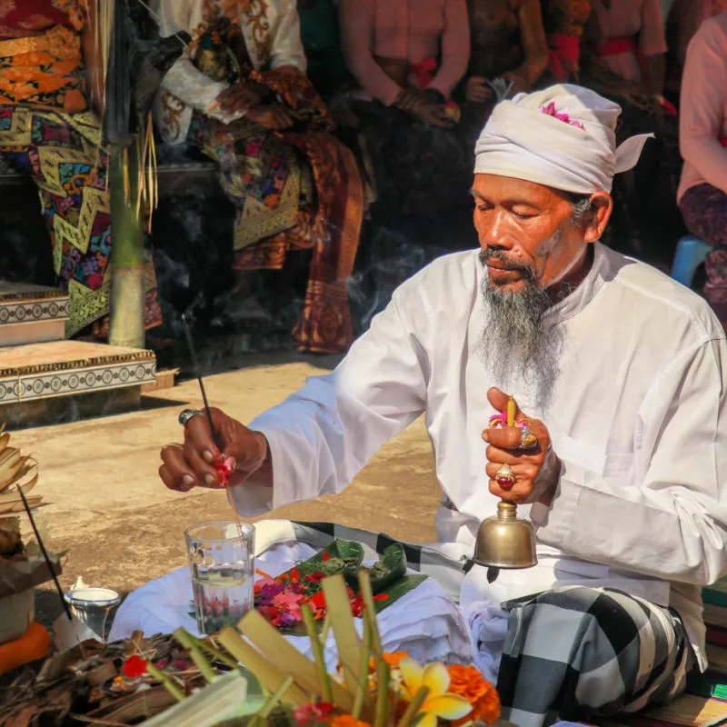 Priest In Bali Completes Cleansing Ritual Ceremony at Temple.jpg