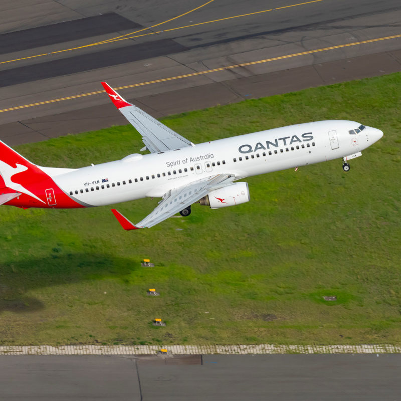 Qantas Airplane Takes Off From Airport Runway