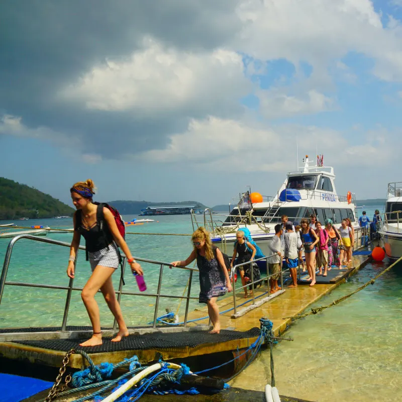 Tourists Get Off Bali Fast Boat