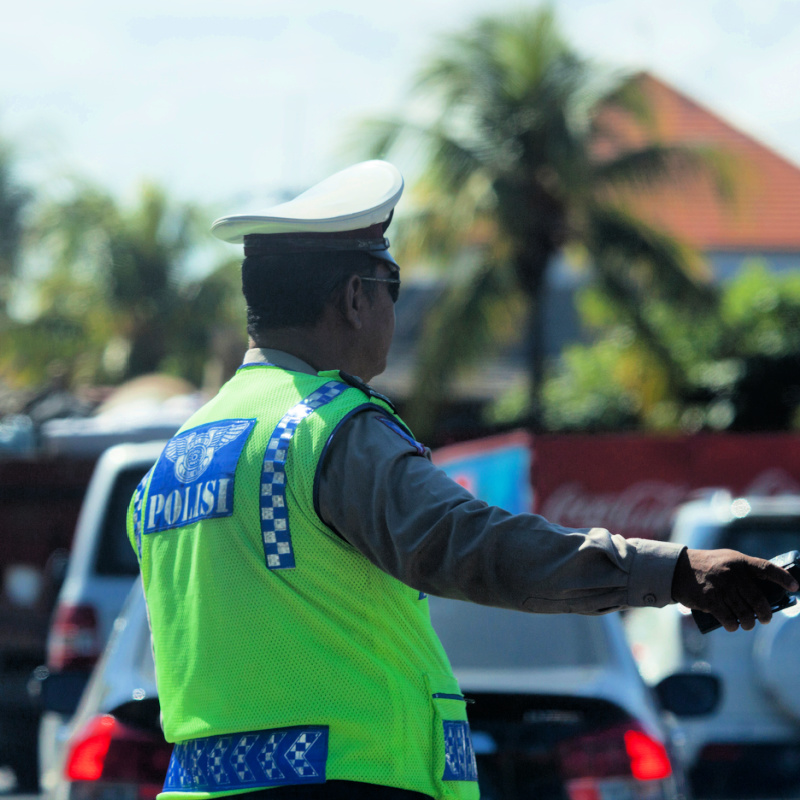 Traffic-Police-Officer-In-Bali-Stands-In-The-Road