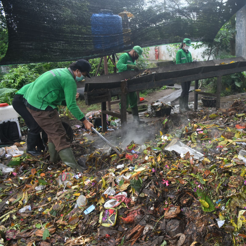 Waste Management Workers Sort Through Organic and In-Organic Waste