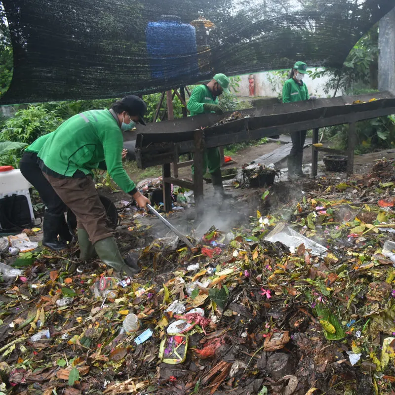Waste Management Workers Sort Through Organic and In-Organic Waste