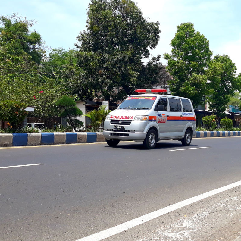 Ambulance Drives Down Quiet Road In Bali