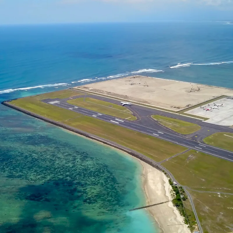 Bali Airport Runway Stands Over Reclaimed Ocean.