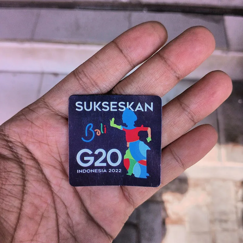 Bali G20 Sticker Held On Hand.
