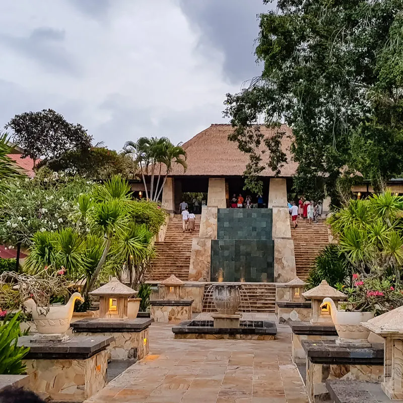 Entrance To Luxury Bali Hotel With High Steps And Traditional Shala Building