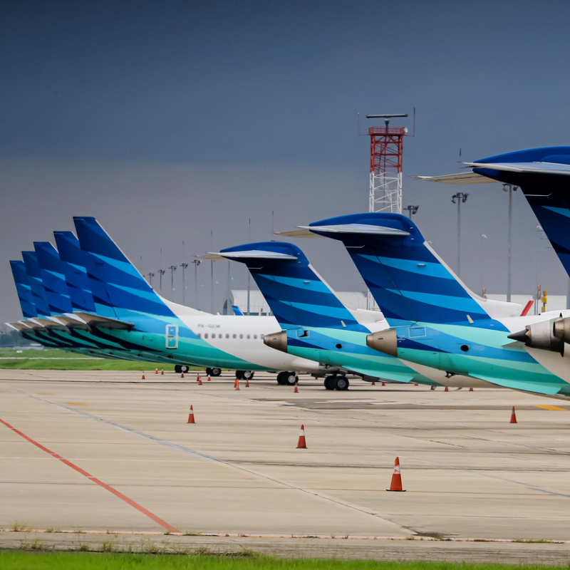 Garuda Indonesia Airplanes Lined Up At Airport