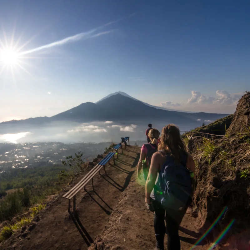Tourists Walk Down From Mount Batur Sunrise Spot In Bali