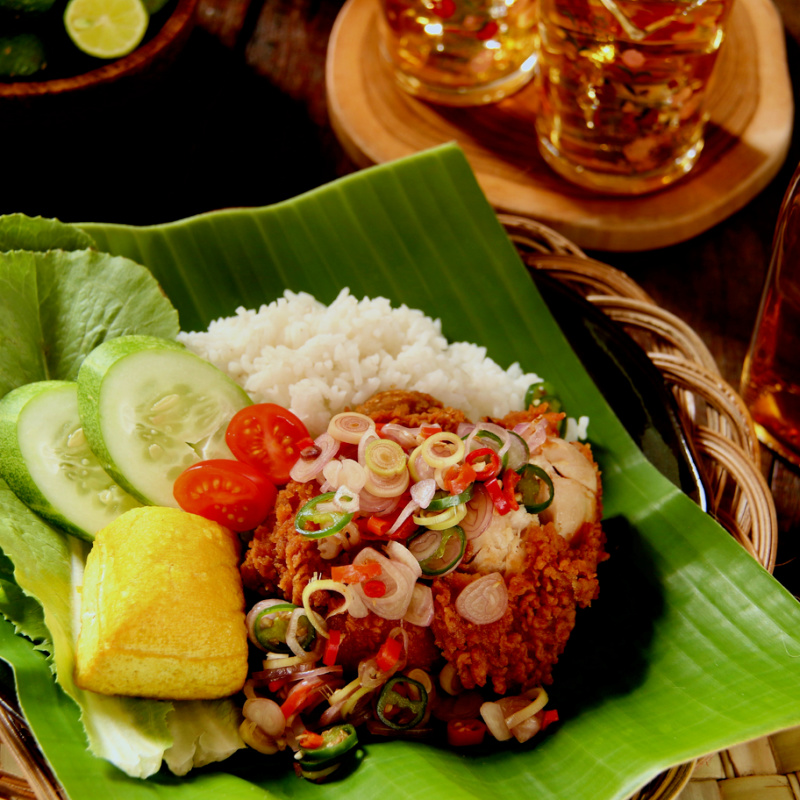 Traditional Balinese Dinner Food Including Rice Ayam Sambal Matah, Tofu and Veg.