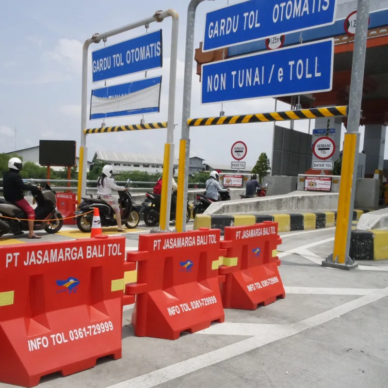 Traffic Mopeds Line Up To Enter The Bali Toll Road Gate