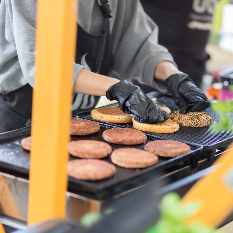Burgers Cooking On Food Truck Cart Stall