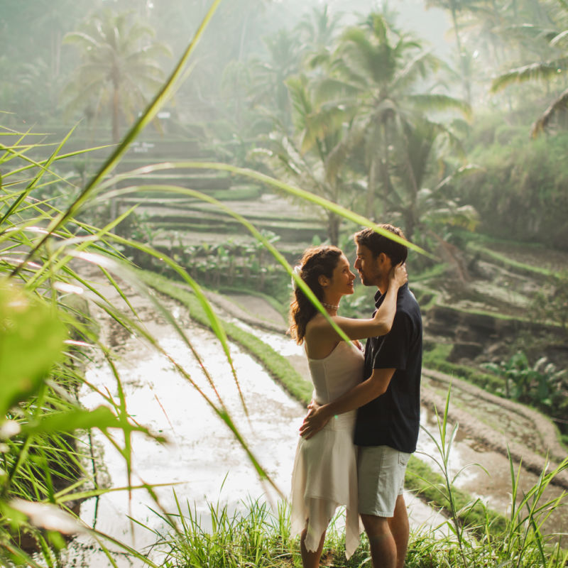 Couple Look Lovingly At Each Other At Bali Rice Fields