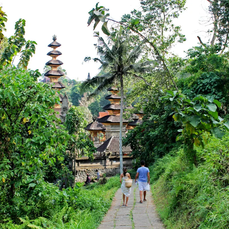 Couple Walk Towards Bali Temple