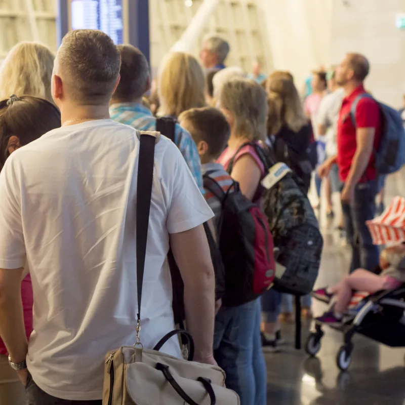 People-Stand-In-Airport-Line-Queue